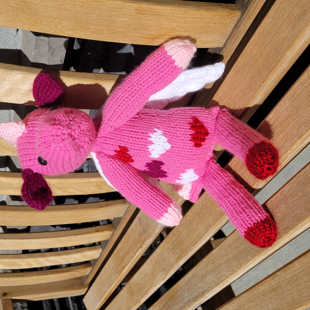Singing Bright Pink Stuffed Dragon with Soft Texture and Embroidered Hearts